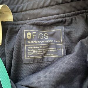 Navy blue figs joggers. Medium petite like new condition only worn a few times